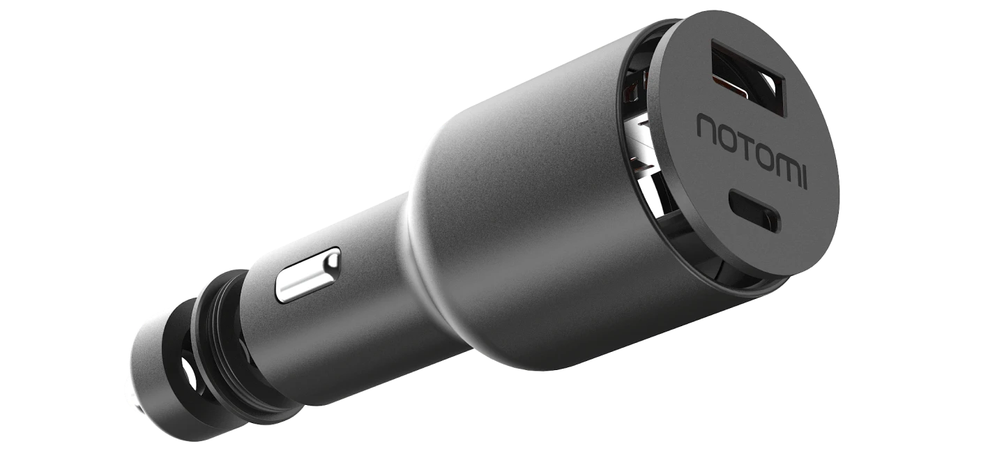 Rozłożona ładowarka samochodowa Notomi 65 W z portami USB-C i USB-A oraz widocznymi elementami obudowy.